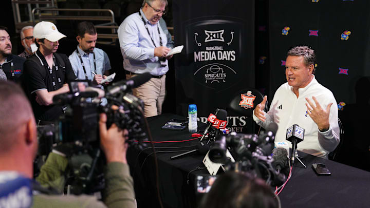 Oct 23, 2024; Kansas City, MO, USA; Kansas Jayhawks head coach Bill Self talks to media during the Big 12 Men’s Basketball Media Day at T-Mobile Center. Mandatory Credit: Jay Biggerstaff-Imagn Images