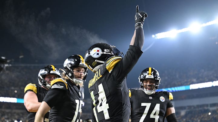 Jan 4, 2026; Pittsburgh, Pennsylvania, USA; Pittsburgh Steelers running back Kenneth Gainwell (14)reacts after rushing for a touchdown against the Baltimore Ravens during the second half at Acrisure Stadium. Mandatory Credit: Barry Reeger-Imagn Images