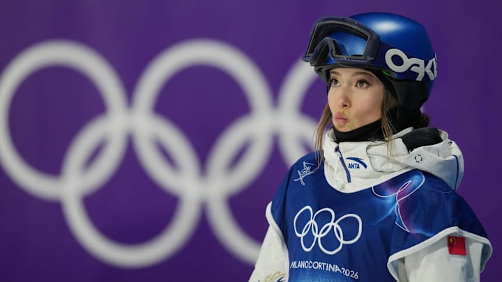 Feb 14, 2026; Livigno, Italy; Ailing Eileen Gu of China reacts after her first jump in the women's freestyle skiing big air qualification during the Milano Cortina 2026 Olympic Winter Games at Livigno Snow Park. Mandatory Credit: Joe Camporeale-Imagn Images