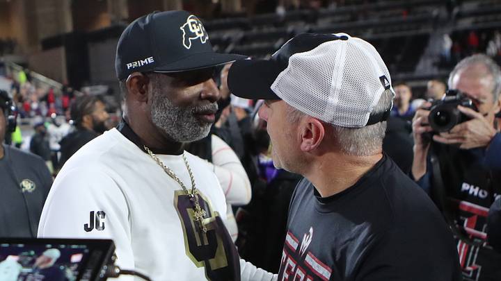 Nov 9, 2024; Lubbock, Texas, USA; Colorado Buffalos head coach Deion Sanders and Texas Tech Red Raiders head coach Joey McGuire after the game at Jones AT&T Stadium and Cody Campbell Field. Mandatory Credit: Michael C. Johnson-Imagn Images