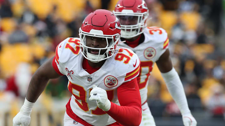 Dec 25, 2024; Pittsburgh, Pennsylvania, USA;  Kansas City Chiefs defensive end Felix Anudike-Uzomah (97)  pass rushes at the line of scrimmage against the Pittsburgh Steelers during the fourth quarter at Acrisure Stadium. Mandatory Credit: Charles LeClaire-Imagn Images