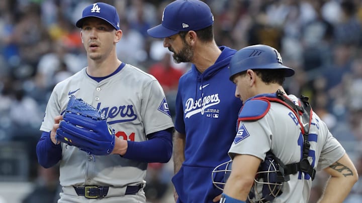 Jun 6, 2024; Pittsburgh, Pennsylvania, USA; Los Angeles Dodgers startingpitcher Walker Buehler (21) and pitching coach Mark Prior (middle) and catcher Austin Barnes (15) confer on the mound against the Pittsburgh Pirates during the third inning at PNC Park. Mandatory Credit: Charles LeClaire-Imagn Images Jun 6, 2024; Pittsburgh, Pennsylvania, USA; Los Angeles Dodgers startingpitcher Walker Buehler (21) and pitching coach Mark Prior (middle) and catcher Austin Barnes (15) confer on the mound against the Pittsburgh Pirates during the third inning at PNC Park. Mandatory Credit: Charles LeClaire-Imagn Images