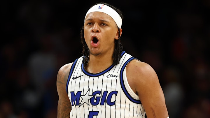 Feb 21, 2026; Phoenix, Arizona, USA; Orlando Magic forward Paolo Banchero (5) against the Phoenix Suns at Mortgage Matchup Center. Mandatory Credit: Mark J. Rebilas-Imagn Images