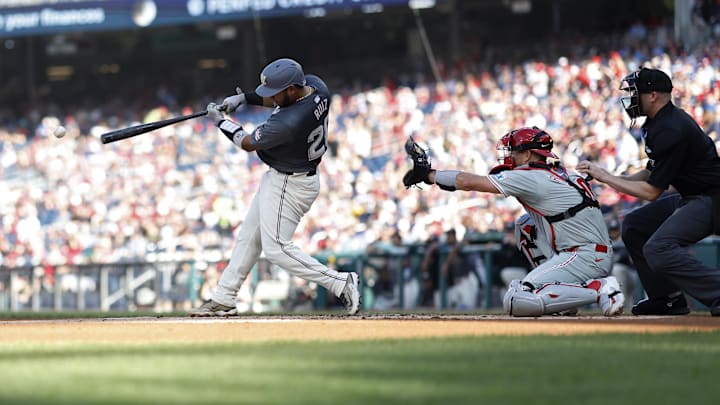 Sep 28, 2024; Washington, District of Columbia, USA; Washington Nationals catcher Keibert Ruiz (20) singles against the Philadelphia Phillies during the first inning at Nationals Park. Sep 28, 2024; Washington, District of Columbia, USA; Washington Nationals catcher Keibert Ruiz (20) singles against the Philadelphia Phillies during the first inning at Nationals Park.