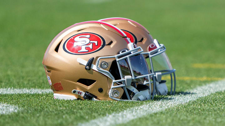 Jul 28, 2022; Santa Clara, CA, USA; San Francisco 49ers helmets on the turf during training camp at the SAP Performance Facility near Levi Stadium. Mandatory Credit: Stan Szeto-Imagn Images Jul 28, 2022; Santa Clara, CA, USA; San Francisco 49ers helmets on the turf during training camp at the SAP Performance Facility near Levi Stadium. Mandatory Credit: Stan Szeto-Imagn Images