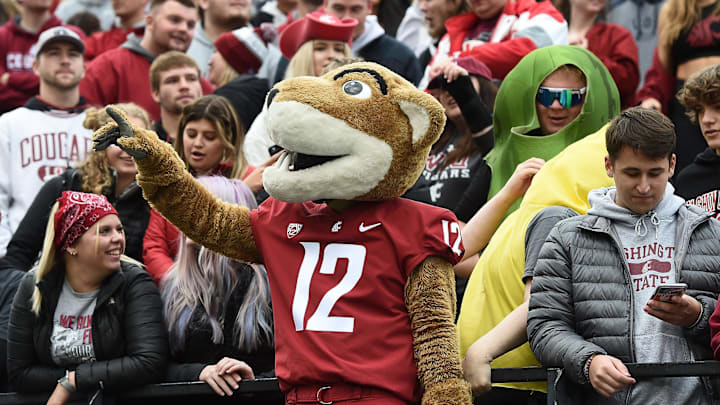 Oct 23, 2021; Pullman, Washington, USA; Washington State Cougars mascot Butch stand with the student section during a game against the Brigham Young Cougars in the first half at Gesa Field at Martin Stadium. Mandatory Credit: James Snook-Imagn Images Oct 23, 2021; Pullman, Washington, USA; Washington State Cougars mascot Butch stand with the student section during a game against the Brigham Young Cougars in the first half at Gesa Field at Martin Stadium. Mandatory Credit: James Snook-Imagn Images