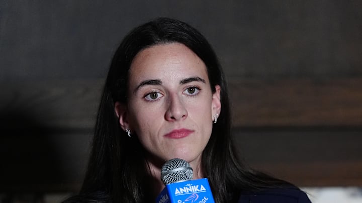 Indiana Fever guard Caitlin Clark speaks at a press conference.