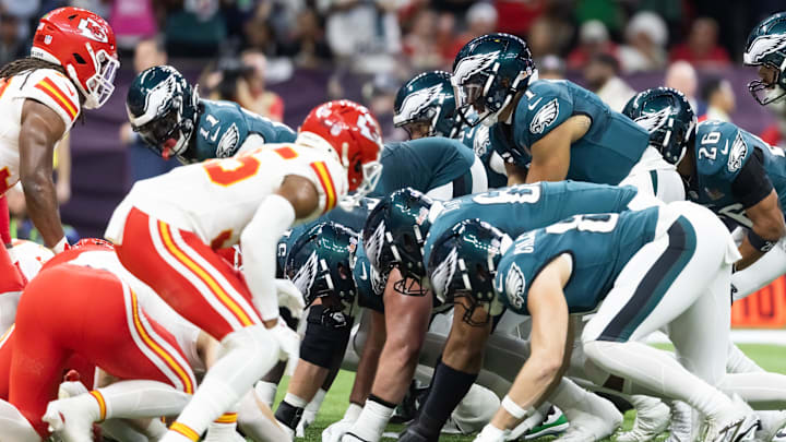 Feb 9, 2025; New Orleans, LA, USA; Philadelphia Eagles  quarterback Jalen Hurts (1) lines up for the tush push play on the goal line against the Kansas City Chiefs during Super Bowl LIX at Ceasars Superdome. Mandatory Credit: Mark J. Rebilas-Imagn Images