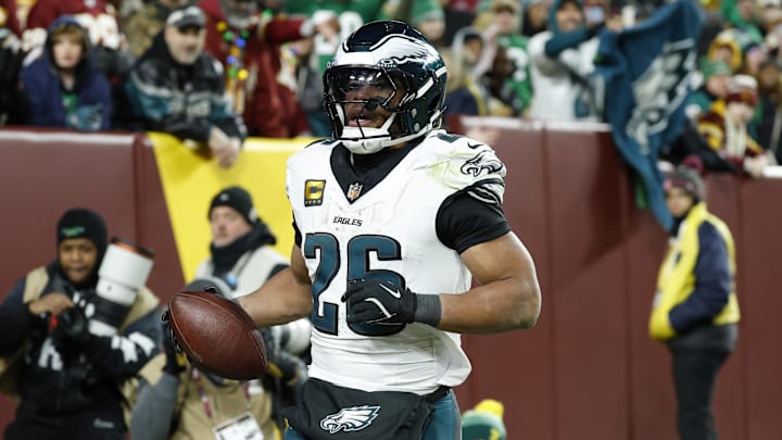 Dec 20, 2025; Landover, Maryland, USA; Philadelphia Eagles running back Saquon Barkley (26) celebrates after scoring a touchdown against the Washington Commanders in the second half at Northwest Stadium. Dec 20, 2025; Landover, Maryland, USA; Philadelphia Eagles running back Saquon Barkley (26) celebrates after scoring a touchdown against the Washington Commanders in the second half at Northwest Stadium.