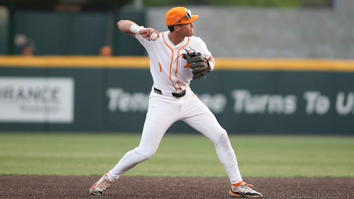 Tennessee infielder Dean Curley (1) throws the ball to first base for an out during a NCAA baseball game between Tennessee and Kentucky at Lindsey Nelson Stadium in Knoxville, Tenn., on April 18, 2025.