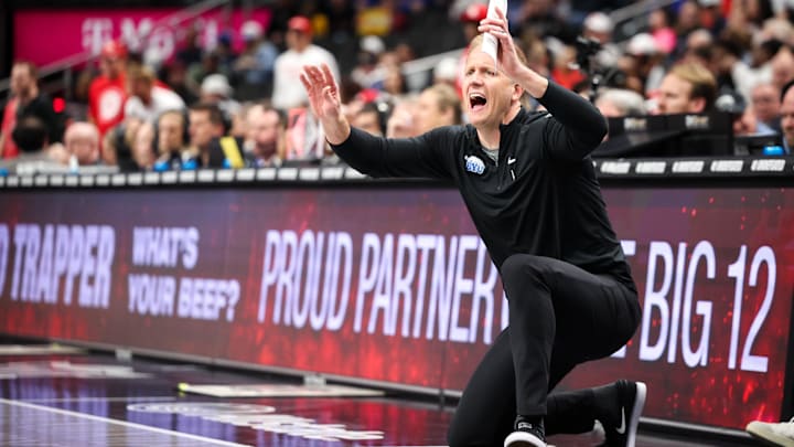 Mar 14, 2025; Kansas City, MO, USA; Brigham Young Cougars coach Kevin Young during the first half against the Houston Cougars at T-Mobile Center. Mandatory Credit: William Purnell-Imagn Images