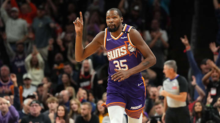 Nov 6, 2024; Phoenix, Arizona, USA; Phoenix Suns forward Kevin Durant (35) celebrates a basket against the Miami Heat during the second half at Footprint Center. Mandatory Credit: Joe Camporeale-Imagn Images
