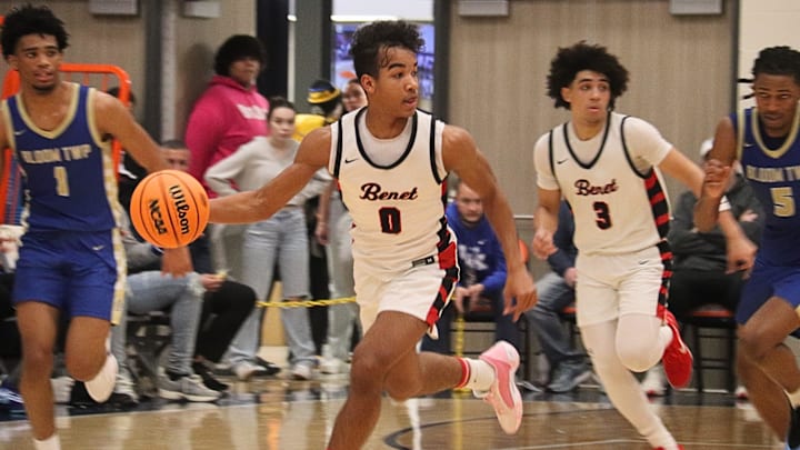 Blake Fagbemi of Benet Academy leads a break in a quarterfinal game at the 93rd Pontiac Holiday Tournament. Blake Fagbemi of Benet Academy leads a break in a quarterfinal game at the 93rd Pontiac Holiday Tournament.