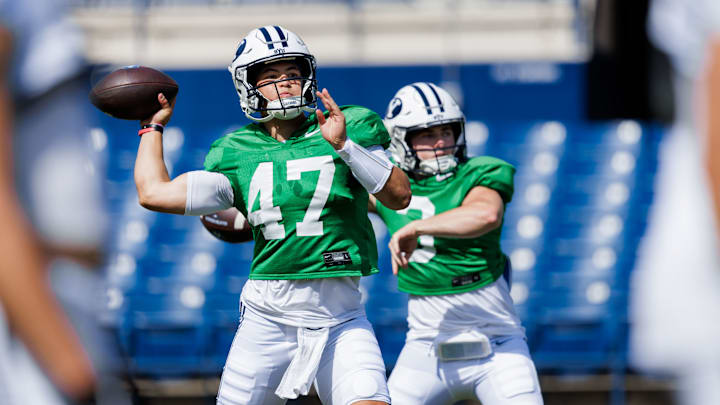 BYU quarterbacks Bear Bachmeier and McCae Hillstead warm up for the first scrimmage of Fall Camp BYU quarterbacks Bear Bachmeier and McCae Hillstead warm up for the first scrimmage of Fall Camp