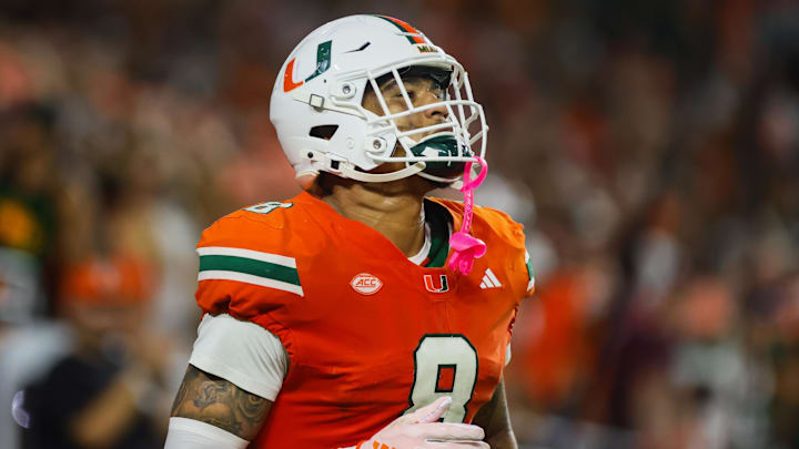 Sep 27, 2024; Miami Gardens, Florida, USA; Miami Hurricanes tight end Elijah Arroyo (8) looks on after scoring a touchdown against the Virginia Tech Hokies during the first quarter at Hard Rock Stadium.