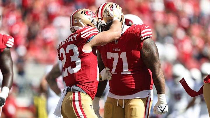 Christian McCaffrey, Trent Williams, San Francisco 49ers