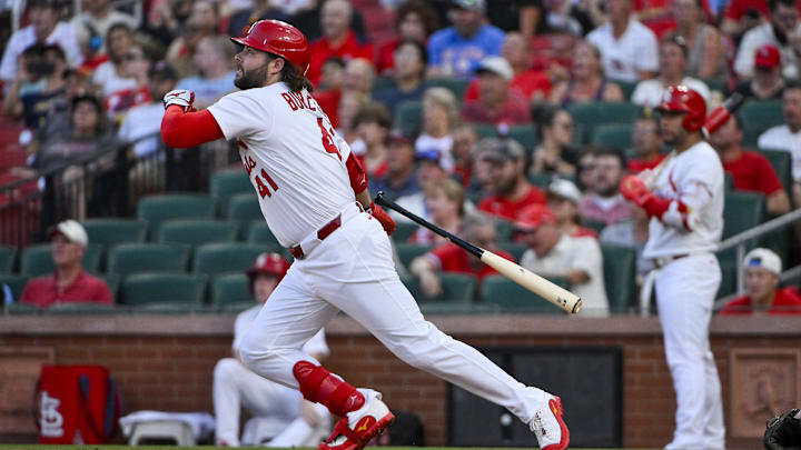 Aug 11, 2025; St. Louis, Missouri, USA; St. Louis Cardinals left fielder Alec Burleson (41) hits a one run single against the Colorado Rockies during the third inning at Busch Stadium. Mandatory Credit: Jeff Curry-Imagn Images Aug 11, 2025; St. Louis, Missouri, USA; St. Louis Cardinals left fielder Alec Burleson (41) hits a one run single against the Colorado Rockies during the third inning at Busch Stadium. Mandatory Credit: Jeff Curry-Imagn Images
