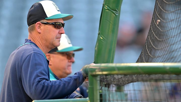 Jul 24, 2025; Anaheim, California, USA;  Seattle Mariners manager Dan Wilson (6) looks on during batting practice prior to the game against the Los Angeles Angels at Angel Stadium. Mandatory Credit: Jayne Kamin-Oncea-Imagn Images