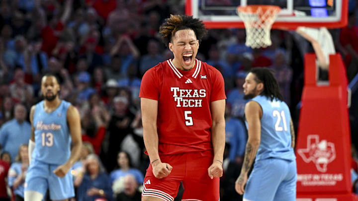 Feb 1, 2025; Houston, Texas, USA; Texas Tech Red Raiders forward Darrion Williams (5) reacts after shooting a three point basket to tie the game with seconds left on the clock against the Houston Cougars at Fertitta Center. Mandatory Credit: Maria Lysaker-Imagn Images 
