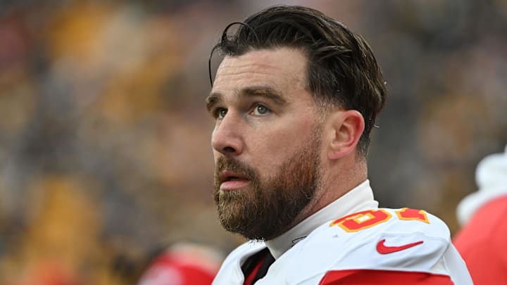 Dec 25, 2024; Pittsburgh, Pennsylvania, USA; Kansas City Chiefs tight end Travis Kelce (87) watch the action against the Pittsburgh Steelers during the second half at Acrisure Stadium. Mandatory Credit: Barry Reeger-Imagn Images
