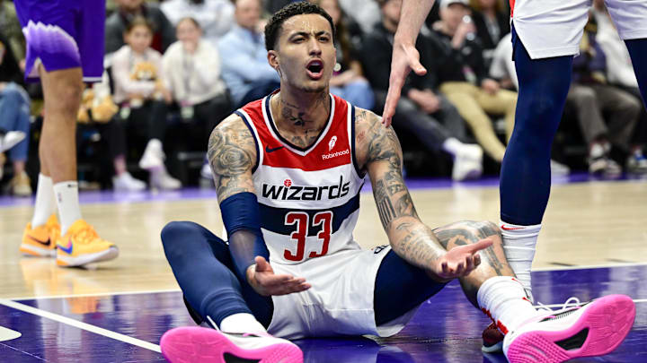 Mar 4, 2024; Salt Lake City, Utah, USA; Washington Wizards forward Kyle Kuzma (33) reacts on the ground to a call against the Utah Jazz during the second half at the Delta Center. Mandatory Credit: Christopher Creveling-Imagn Images Mar 4, 2024; Salt Lake City, Utah, USA; Washington Wizards forward Kyle Kuzma (33) reacts on the ground to a call against the Utah Jazz during the second half at the Delta Center. Mandatory Credit: Christopher Creveling-Imagn Images