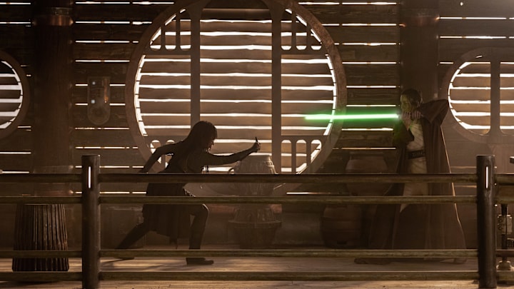 (L-R): Mae (Amandla Stenberg) and Jedi Master Indara (Carrie-Anne Moss) in Lucasfilm's THE ACOLYTE, exclusively on Disney+. ©2024 Lucasfilm Ltd. & TM. All Rights Reserved.