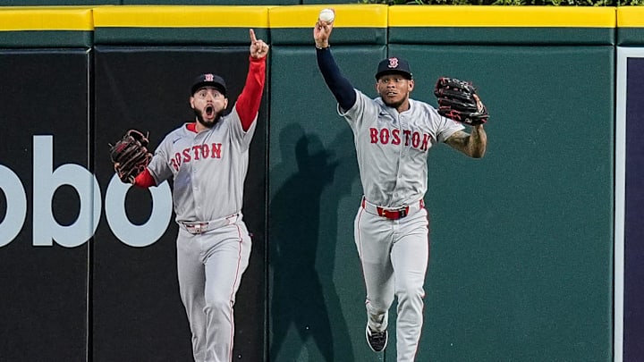 Boston Red Sox center fielder Ceddanne Rafaela (3), right, celebrates catching a fly out against Detroit Tigers designated hitter Kerry Carpenter (30) next to right fielder Rob Refsnyder (30), left, during the seventh inning at Comerica Park in Detroit on Wednesday, May 14, 2025. Boston Red Sox center fielder Ceddanne Rafaela (3), right, celebrates catching a fly out against Detroit Tigers designated hitter Kerry Carpenter (30) next to right fielder Rob Refsnyder (30), left, during the seventh inning at Comerica Park in Detroit on Wednesday, May 14, 2025.