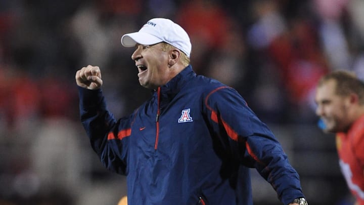 Dec 20, 2008; Las Vegas, NV, USA; Arizona Wildcats coach Mike Stoops reacts during the Wildcats' 31-21 victory over the Brigham Young Cougars in the Las Vegas Bowl at Sam Boyd Stadium. Mandatory Credit: Kirby Lee/Image of Sport-Imagn Images