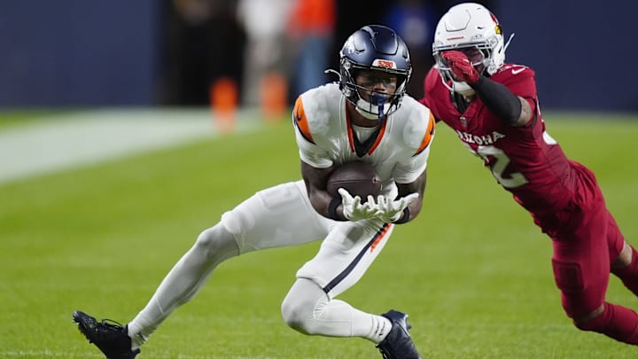 Aug 16, 2025; Denver, Colorado, USA; Arizona Cardinals safety Joey Blount (32) defends on Denver Broncos wide receiver Troy Franklin (11) in the second quarter at Empower Field at Mile High. Aug 16, 2025; Denver, Colorado, USA; Arizona Cardinals safety Joey Blount (32) defends on Denver Broncos wide receiver Troy Franklin (11) in the second quarter at Empower Field at Mile High.