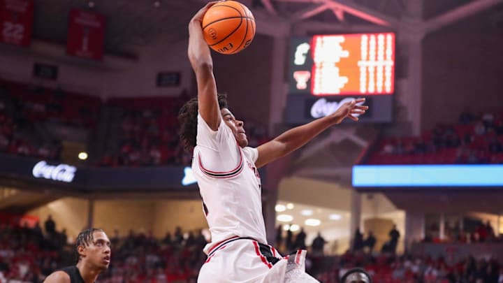 Texas Tech's Christian Anderson rises for a dunk against Cincinnati during a Big 12 Conference men's basketball game, Tuesday, Feb. 24, 2026, in United Supermarkets Arena. Texas Tech's Christian Anderson rises for a dunk against Cincinnati during a Big 12 Conference men's basketball game, Tuesday, Feb. 24, 2026, in United Supermarkets Arena.