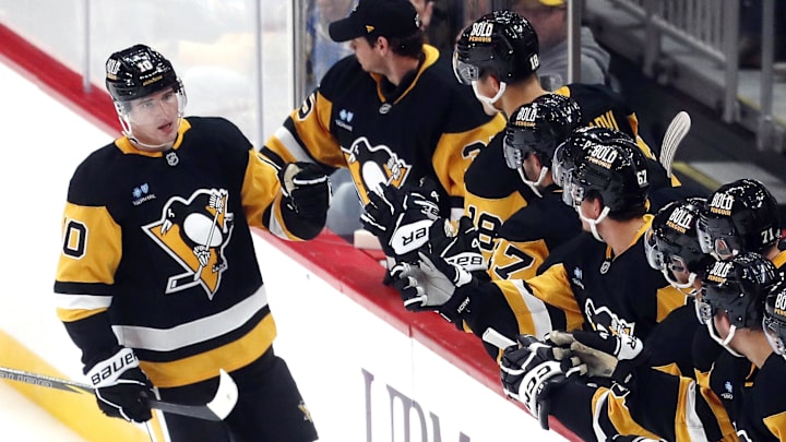 Oct 16, 2024; Pittsburgh, Pennsylvania, USA; Pittsburgh Penguins left wing Drew O'Connor (10) celebrates teammates after scoring a short-handed goal against the Buffalo Sabres during the second period at PPG Paints Arena. Mandatory Credit: Charles LeClaire-Imagn Images