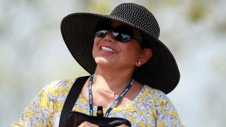 Kultida Woods, pictured while watching her son Tiger play in 2012 at the Honda Classic, has died.