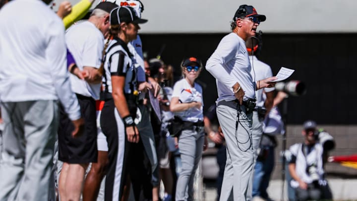 Oct 4, 2025; Tucson, Arizona, USA; Oklahoma State Cowboys interim head coach Doug Meacham watches game play against the Arizona Wildcats during the second quarter at Arizona Stadium. Mandatory Credit: Aryanna Frank-Imagn Images