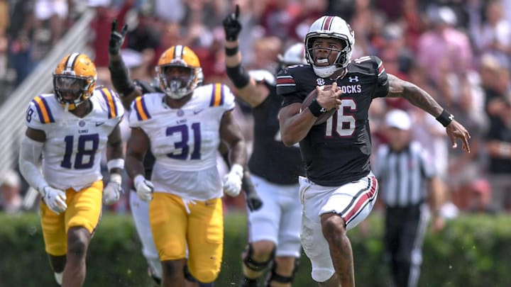 Sep 14, 2024; Columbia, South Carolina, USA; South Carolina Gamecocks quarterback LaNorris Sellers (16) runs for a touchdown against the LSU Tigers during the second quarter at Williams-Brice Stadium. Mandatory Credit: Ken Ruinard/USA TODAY Network via Imagn Images
