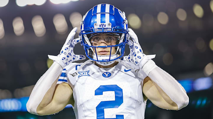 BYU wide receiver Chase Roberts warms up for the Cincinnati game