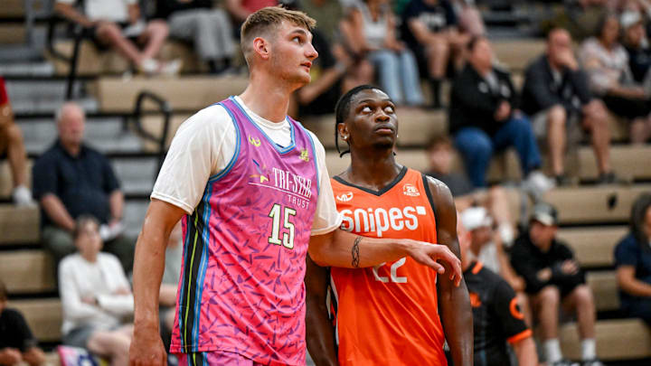Team Tri-Star and Michigan State's Carson Cooper, left, and Team Snipes and Michigan State's Trey Fort look on during the Moneyball Pro-Am on Tuesday, June 24, 2025, at Holt High School.