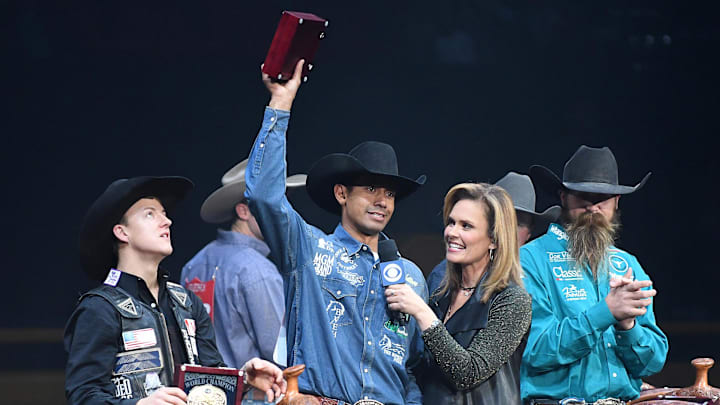 Dec 10, 2016; Las Vegas, NV, USA; Overall winner Junior Nogueira salutes the crowd after receiving his World Champion buckle during an awards ceremony on the final night of the National Finals Rodeo at Thomas & Mack Center. Dec 10, 2016; Las Vegas, NV, USA; Overall winner Junior Nogueira salutes the crowd after receiving his World Champion buckle during an awards ceremony on the final night of the National Finals Rodeo at Thomas & Mack Center.