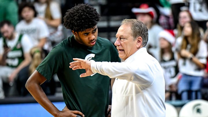Michigan State's head coach Tom Izzo, right, talks with Jase Richardson before the game against Nebraska on Saturday, Dec. 7, 2024, at the Breslin Center in East Lansing.