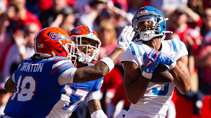 Mississippi Rebels wide receiver Tre Harris (9) hauls in a touchdown pass during the first half against the Florida Gators. Mississippi Rebels wide receiver Tre Harris (9) hauls in a touchdown pass during the first half against the Florida Gators.