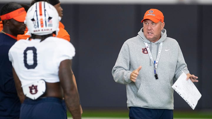 Auburn Tigers head coach Hugh Freeze talks with his team during practice at Woltosz Football Performance Center in Auburn, Ala. on Tuesday, Aug. 26, 2025.