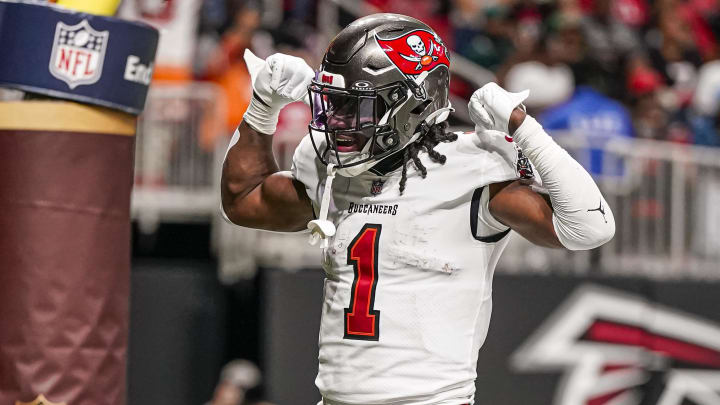 Dec 10, 2023; Atlanta, Georgia, USA; Tampa Bay Buccaneers running back Rachaad White (1) reacts after scoring a touchdown against the Atlanta Falcons at Mercedes-Benz Stadium. Mandatory Credit: Dale Zanine-USA TODAY Sports