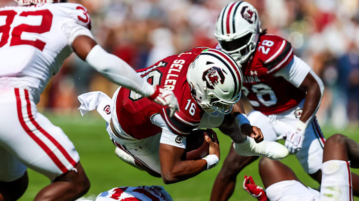 Oct 18, 2025; Columbia, South Carolina, USA; South Carolina Gamecocks quarterback Lanorris Sellers (16) dives for yardage against the Oklahoma Sooners in the second quarter at Williams-Brice Stadium. Mandatory Credit: Jeff Blake-Imagn Images