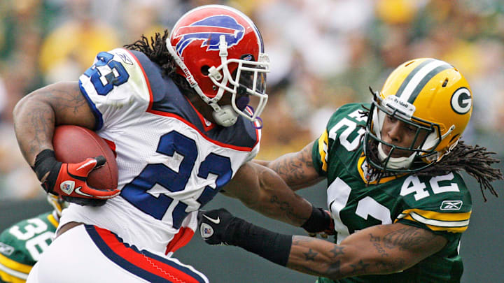 Buffalo Bills Marshawn Lynch breaks an attempted tackle by Green Bay Packers safety Morgan Burnett.