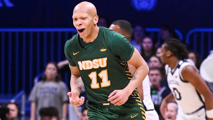 Dec 10, 2024; Indianapolis, Indiana, USA; North Dakota State Bison guard Jacari White (11) celebrates after making a three-point basket during the first half against the Butler Bulldogs at Hinkle Fieldhouse. Mandatory Credit: Robert Goddin-Imagn Images Dec 10, 2024; Indianapolis, Indiana, USA; North Dakota State Bison guard Jacari White (11) celebrates after making a three-point basket during the first half against the Butler Bulldogs at Hinkle Fieldhouse. Mandatory Credit: Robert Goddin-Imagn Images