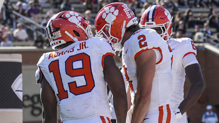 Oct 12, 2024; Winston-Salem, North Carolina, USA; Clemson Tigers quarterback Cade Klubnik (2) congratulates running back Keith Adams Jr. (19) on his score against the Wake Forest Demon Deacons during the second half at Allegacy Federal Credit Union Stadium.