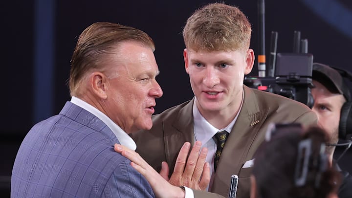 Jun 25, 2025; Brooklyn, NY, USA;  Kasparas Jakucionis reacts with Illinois Fighting Illini head coach Brad Underwood after being selected as the 20th pick by the Miami Heat in the first round of the 2025 NBA Draft at Barclays Center. Mandatory Credit: Brad Penner-Imagn Images