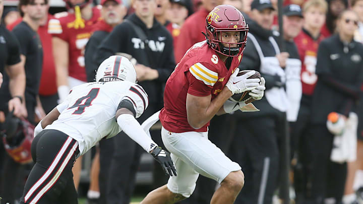 Iowa State Cyclones wide receiver Jayden Higgins (9) makes a catch around Texas Tech Red Raiders defensive back Maurion Horn (4) during the second quarter in the week-10 NCAA football at Jack Trice Stadium on Saturday, Nov. 2, 2024, in Ames, Iowa. Iowa State Cyclones wide receiver Jayden Higgins (9) makes a catch around Texas Tech Red Raiders defensive back Maurion Horn (4) during the second quarter in the week-10 NCAA football at Jack Trice Stadium on Saturday, Nov. 2, 2024, in Ames, Iowa.