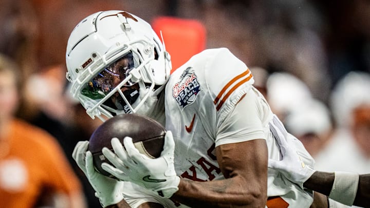 Texas Longhorns wide receiver Matthew Golden (2) catches a long pass for a first down near the end zone in the fourth quarter as the Texas Longhorns play the Arizona State Sun Devils in the Peach Bowl College Football Playoff quarterfinal at Mercedes-Benz Stadium in Atlanta, Georgia, Jan. 1, 2025.