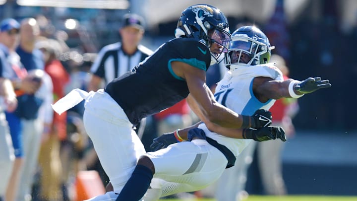 Tennessee Titans linebacker Otis Reese IV (41) breaks up a pass intended for Jacksonville Jaguars wide receiver Zay Jones (7) during second quarter action. Reese was penalized for pass interference on the play. The Jacksonville Jaguars hosted the Tennessee Titans at EverBank Stadium in Jacksonville, FL Sunday, November 19, 2023. The Jaguars led 13 to 0 at the half. [Bob Self/Florida Times-Union]