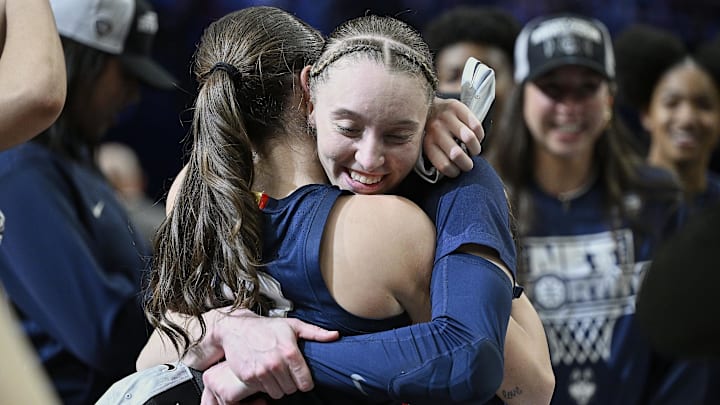 UConn Huskies star Paige Bueckers celebrates with Nika Muhl after beating the USC Trojans in the finals of the Portland Regional of the NCAA Tournament. UConn Huskies star Paige Bueckers celebrates with Nika Muhl after beating the USC Trojans in the finals of the Portland Regional of the NCAA Tournament.
